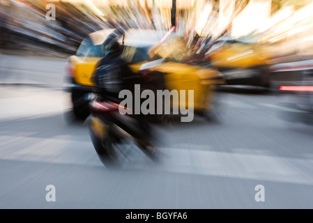 Blurred traffic on city street Stock Photo