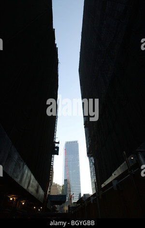 Buildings under construction, skyscraper in background Stock Photo