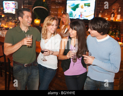 Friends at bar Stock Photo
