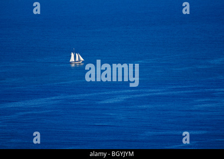 Sailboat in ocean Stock Photo