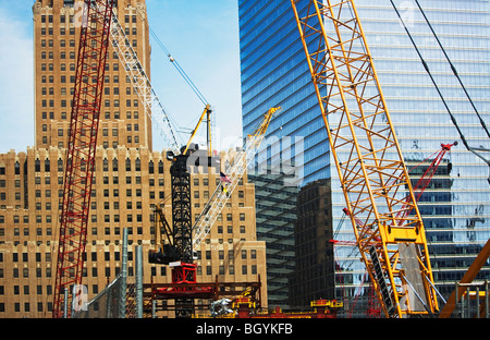 Cranes in front of buildings Stock Photo