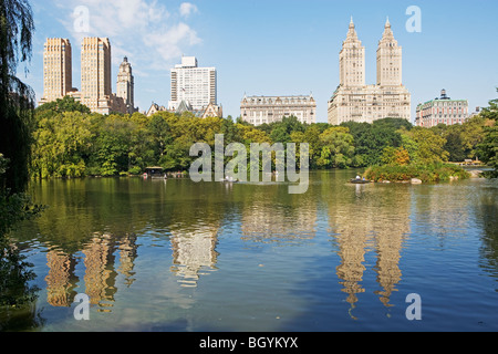 Cityscape reflected in lake Stock Photo