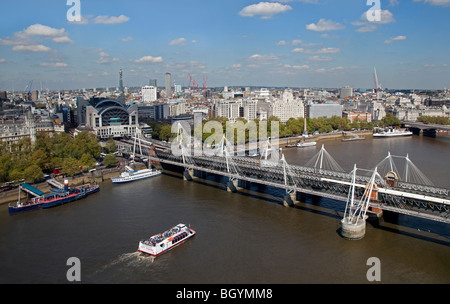 Golden Jubilee (Hungerford Bridge), the city and River Thames, London, England Stock Photo