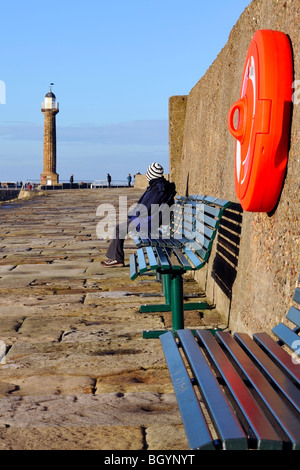 East pier lighthouse, Whitby, Yorkshire, on a sunny winter's day Stock Photo