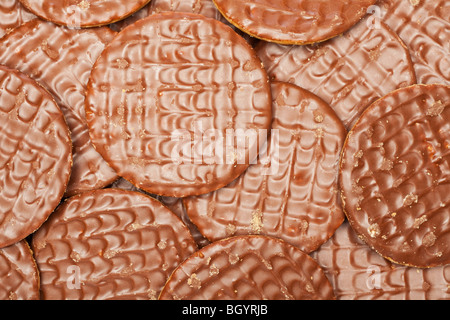 Close up group of milk chocolate digestive biscuits - overhead Stock Photo