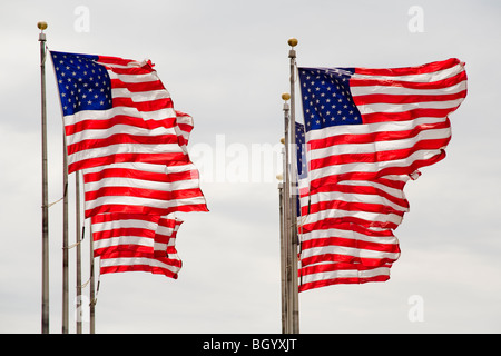 Eight American flags billow in a strong wind in Detroit, Michigan. Stock Photo