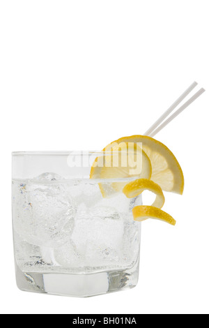 Club soda with lemon slice and peel garnish on white background Stock Photo