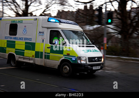 Scottish Ambulance service travelling at speed on and emergency call with blue lights flashing, Edinburgh Scotland Stock Photo
