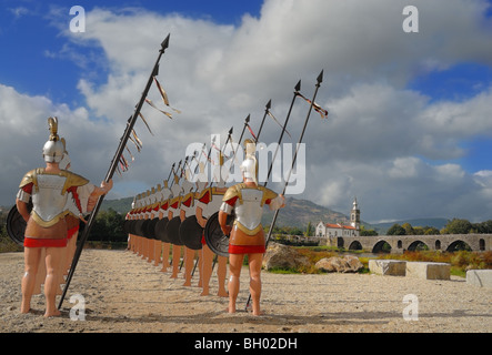 Roman bridge, and the church of Santo Antonio da torre velha, over the river Lima in Ponte Lima, Portugal. Stock Photo