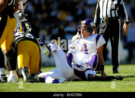 Brett Favre #4 of the Minnesota Vikings looks on from the ground after a pass into the endzone Stock Photo