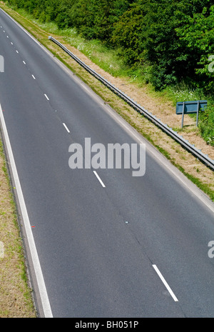 Empty two lane road with white lines in centre Stock Photo
