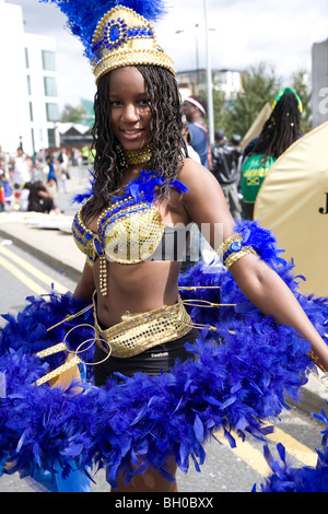 Young woman in carnival costume. Notting Hill Carnival, Notting Hill. London. England. UK. Stock Photo