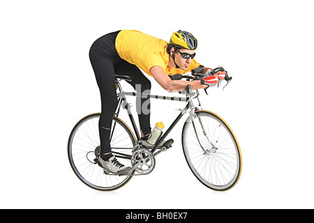 Young biker wearing yellow shirt isolated on white background Stock Photo