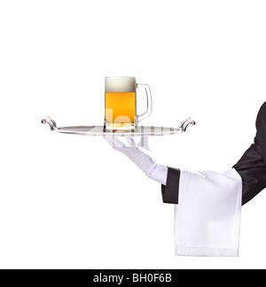 Butler holding a tray with a beer glass on it, isolated on white background Stock Photo