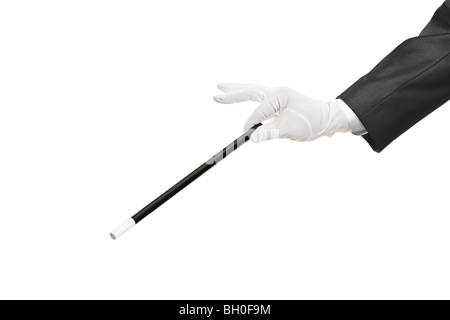 Hand holding a magic wand, isolated on white background Stock Photo