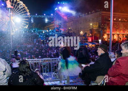 Nice, France, Public Events, Carnival Parade, Crowd Celebrating at Night, Dancing Stock Photo