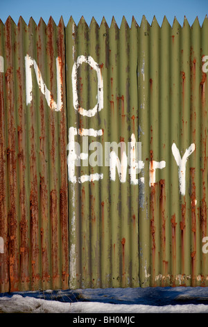 Corrugated metal fence with No Entry Sign Stock Photo