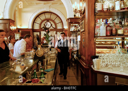 Guests and a waiter at the bar of the Gilli Cafe, Piazza della Republica, Florence, Tuscany, Italy, Europe Stock Photo