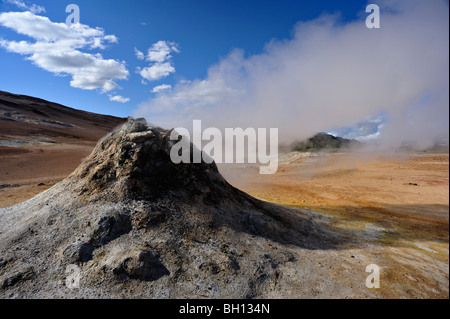 Steaming vent or fumarole under a beautiful summer sky in the geothermal area of Hverarond near Myvatn in northern Iceland Stock Photo