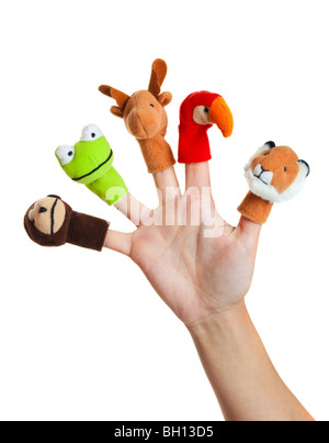 Female hand wearing 5 finger puppets; monkey, frog, reindeer, parrot; lion Stock Photo