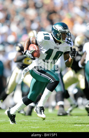 Philadelphia Eagles professional american football club, silhouette of NFL  trophy, logo of the club in background Stock Photo - Alamy