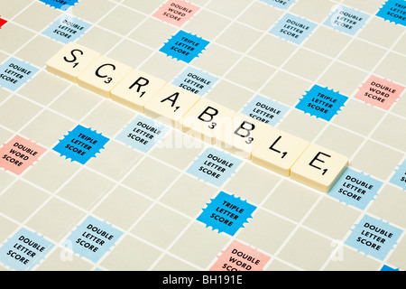 Scrabble game board with scrabble spelled out Stock Photo