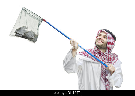 Arab person holding a net with US dollars in it, isolated on white background Stock Photo