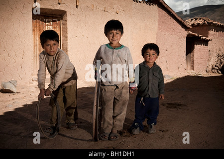 A group of cusquenian young brothers before playing near their house Stock Photo