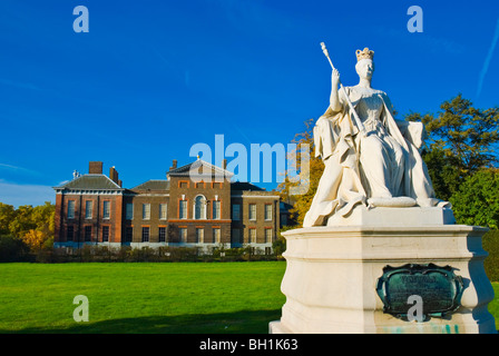 Statue of Queen Victoria in front of Kensington Palace in Kensington Gardens west London England UK Stock Photo