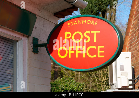 Post Office sign on the wall of a small urban office in Winchester, Hampshire Stock Photo