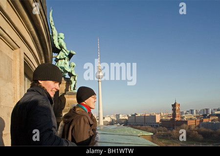 visitors, outer walkway of the Berliner Dom, views of TV tower Alex and Rotes Rathaus, Berlin Germany Stock Photo