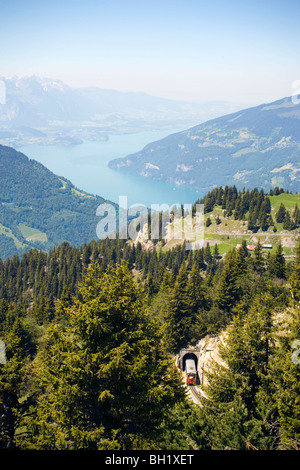 Schynige Platte railway leaving Graetlitunnel, Lake Thun in background, Schynige Platte (1967 m), Interlaken, Bernese Oberland ( Stock Photo