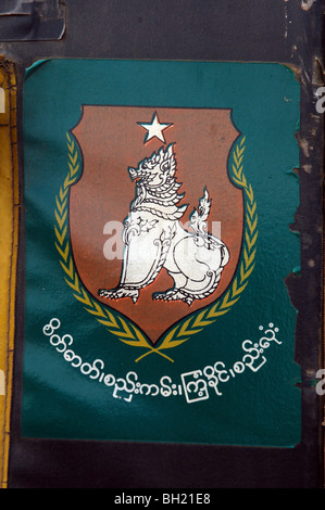 Burmese road signs and banners in Tachileik, MYANMAR Stock Photo