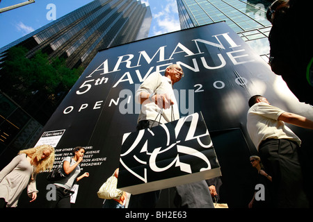 Shoppers walking by the Armani Store on the 5th Avenue Stock Photo
