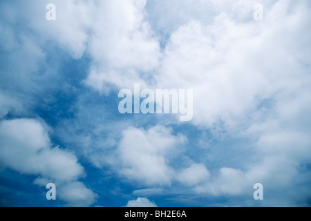 Altocumulus clouds on blue sky day Stock Photo