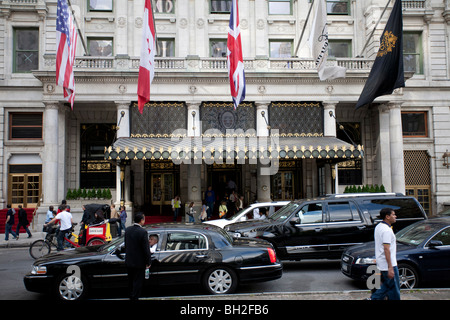 The Plaza Hotel as seen from the corner of 5th Avenue  in Manhattan with limousines waiting before the entrance Stock Photo