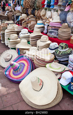 Souvenir stall selling traditional hats at the entrance of Chichen Itza Archaeological Site Yucatan Mexico. Stock Photo