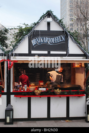 Food stall at Cologne Christmas Market South Bank London December 2009 Stock Photo