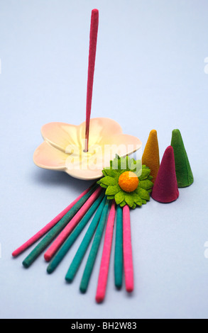 Still life of incense sticks, cones and ceramic holders Stock Photo