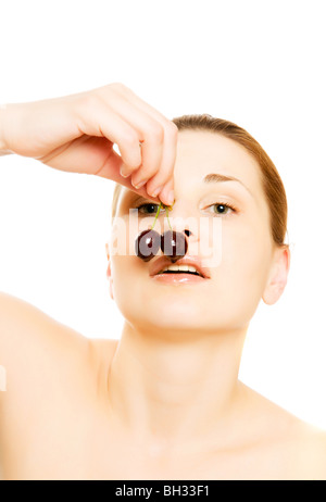 woman with a sweet cherry. Isolation on white Stock Photo