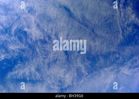 Wide angle shot of subtle cloud patterns high over the earth's surface, the Cirrus clouds are made up in part by ice crystals Stock Photo