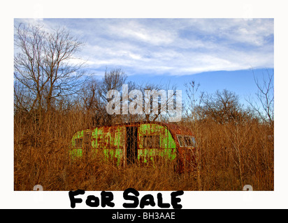 Farm scenes of rural America with rustic barns, charming homes, trailers, corrals, fence lines and roads on the lonesome prairie Stock Photo