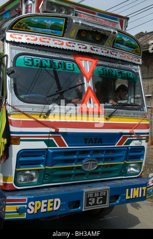 Colourful decorated truck on the road from Kathmandu to Pokhara, Nepal Stock Photo