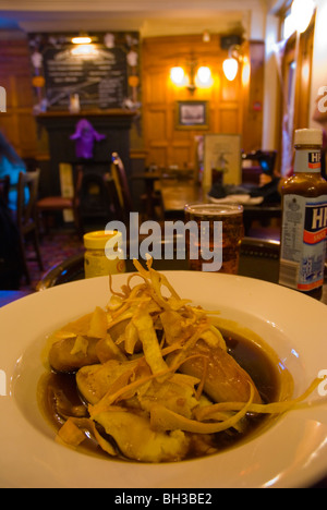 Bangers and mash with gravy and parsnip crisps Brighton England UK Europe Stock Photo