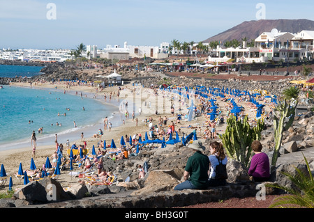 Playa Blanca Lanzarote beach beaches sun lounger loungers bathing bath ...