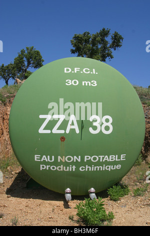 DFCI WATER RESERVE, 30 M3 TANK FOR FOREST FIRE PREVENTION, DFCI, (PROTECTION OF FORESTS AGAINST FIRES) SOUTHERN CORSICA, FRANCE Stock Photo