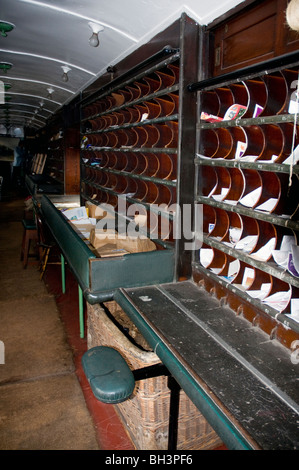 inside view of a traveling post office train carriage Stock Photo