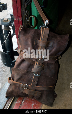 inside view of a traveling post office train carriage showing leather mail satchel Stock Photo