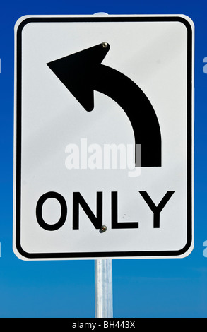 A left turn only road sign isolated on a graduated blue background. Stock Photo