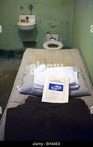 Typical prison cell with rules manual for new prisoners, Alcatraz Island, Golden Gate National Recreation Area, San Francisco Stock Photo